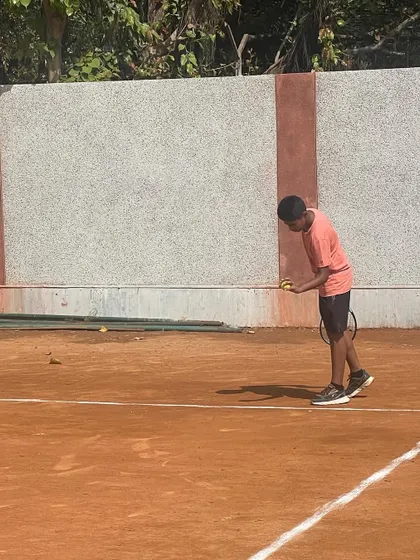 A player getting ready to serve during our internal Round Robin tournament. Competition is a regular part of our training schedule.