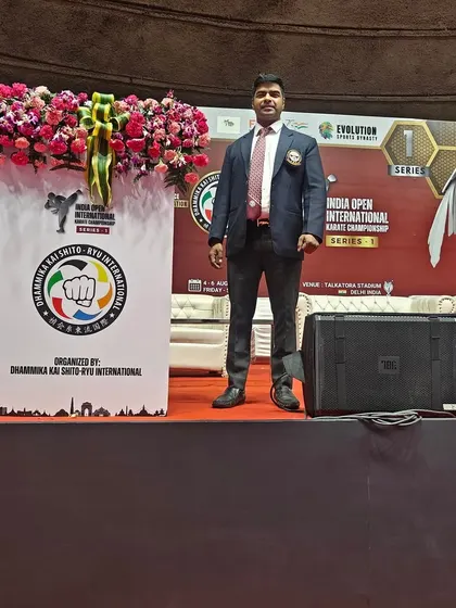 On stage at the India Open International Karate Championship. My presence at these events ensures my students have a direct line to national and international platforms.