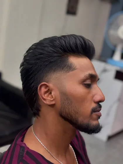 A final shot of the pompadour-mullet, a truly unique style.