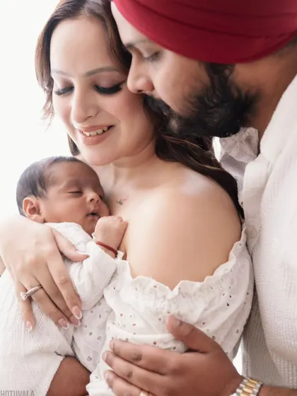 Those first few days are so precious. We specialize in newborn photography that captures the peaceful, tender moments between parents and their new baby, creating memories that last long after they've grown.