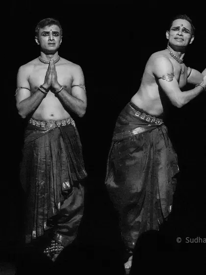 A black and white still of me and Adithya PV during 'ĀBHA'. The image captures the bond and shared energy between the performers.