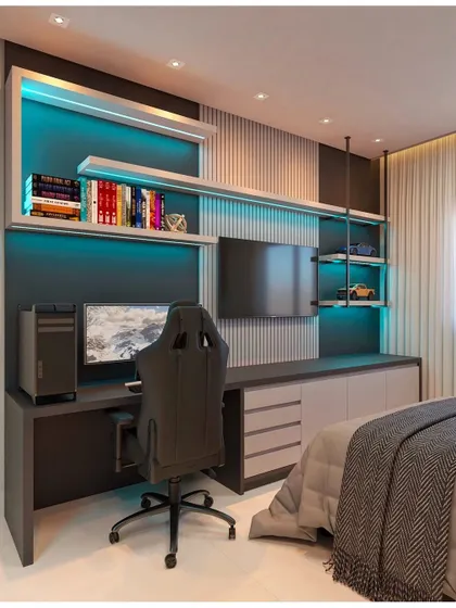 A modern gaming and study room. The design includes built-in shelving with LED backlighting and a large desk, creating a high-tech and immersive environment.