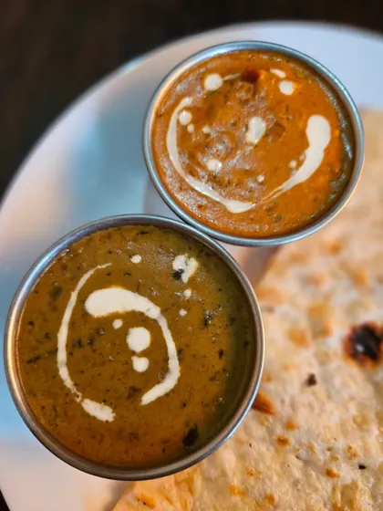 A classic combination for any North Indian food lover: our creamy Dal Makhani and rich Paneer Butter Masala, served with hot butter phulkas. This is comfort food at its best.