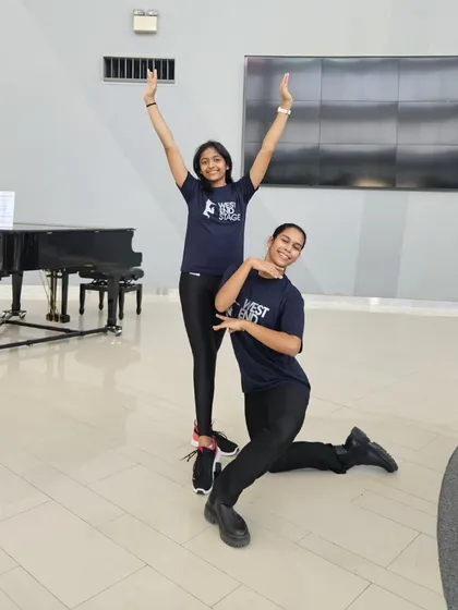 Our students Kiara Banerjee and Maya Haridas at the West End Stage Dubai's Summer School, exploring the world of musical theatre and expanding their skills as performing artists.
