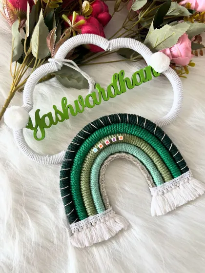 Another beautiful layout of the 'Yashwardhan' name hanging, showcasing its earthy and natural tones.