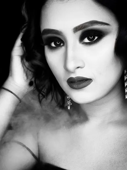 Elegance in monochrome. This black and white divine makeup look is a powerful demonstration of how to create drama and dimension using only shades of black, white, and grey.