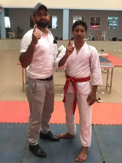 Celebrating one of our students, wearing a red belt, after being selected for the Uttar Kannada District Level School Karate Sports. The first step towards a bigger stage.