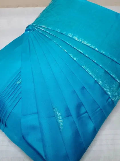 Your saree's rescue team is here. This bright blue saree is now ready to be draped flawlessly, without any of the usual struggle.
