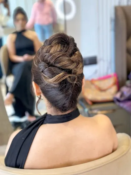 A behind-the-scenes shot of the topknot, showing the beautiful highlights and lowlights in the hair.