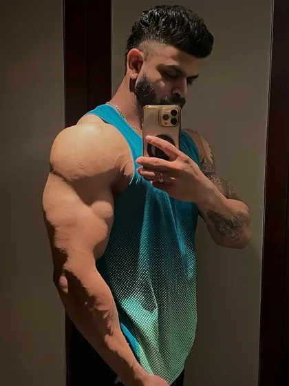 A close-up on arm size and vascularity, key indicators of a successful muscle-building phase.