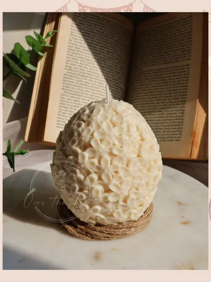 A close-up of the large floral Easter egg candle. It's a real showstopper and looks beautiful as a centerpiece.