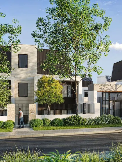 A closer view of the same townhouse, focusing on the entrance and the mix of materials like light stone, dark paneling, and lush greenery.