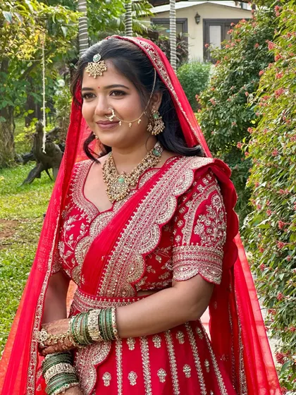 The bride's serene expression is perfectly complemented by the soft, glowing makeup. This look is ideal for outdoor or daytime ceremonies, providing a fresh and radiant finish.