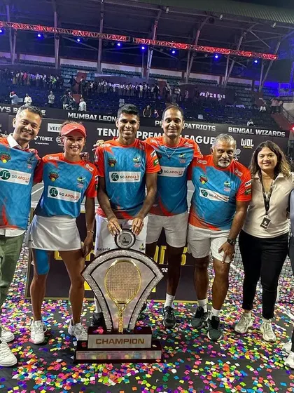 With the champion team of the Tennis Premier League. It's incredibly rewarding to be part of the support staff that helps a team lift the trophy.
