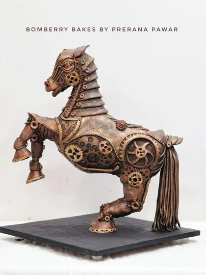 This is my award-winning Steampunk horse, a fully sculpted cake that won Gold at Cakeology 2023. It shows the level of artistry possible with advanced structural and sculpting techniques, which I teach in my specialized masterclasses.