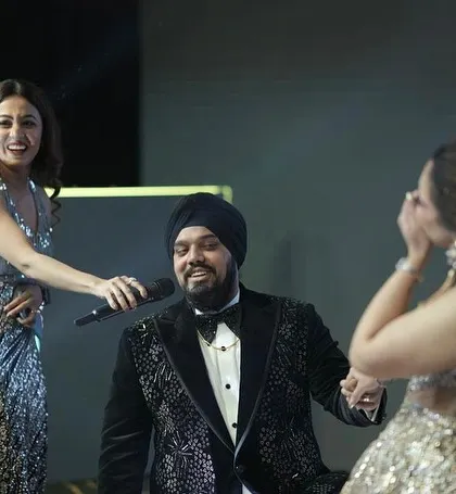 Sharing a laugh with the couple on stage. These happy, unscripted moments are what make a wedding celebration truly special and memorable for everyone.