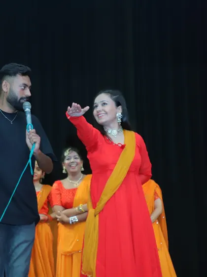 Interacting with a performer on stage. My job is to make the artists feel comfortable and to bridge the gap between them and the audience.