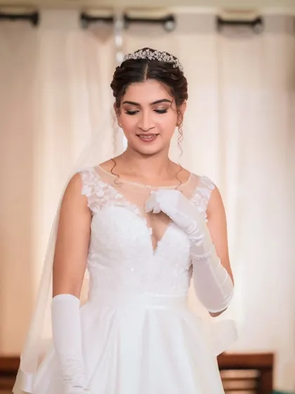 Crafted a look fit for a queen. This bride's stunning gown and regal hair accessory demanded a makeup look that was nothing short of majestic.