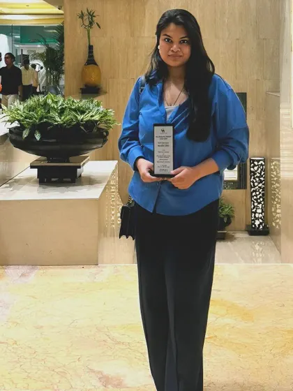 Posing with my award. I am so grateful for these moments that celebrate the hard work and dedication that goes into every project.