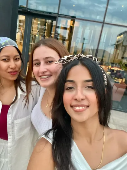 A happy selfie with new friends made during one of my international gigs.
