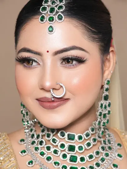 A close-up of the flawless base and silver eyeshadow in this student's portfolio work.