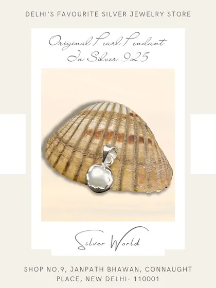 This pendant features an original mother of pearl set in a simple, pure silver bezel. Its natural iridescence makes it a beautiful piece for everyday wear.