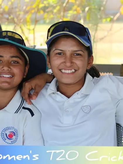 Teammates sharing a light moment in the dugout during the CBR Women's T20 Cricket Cup.