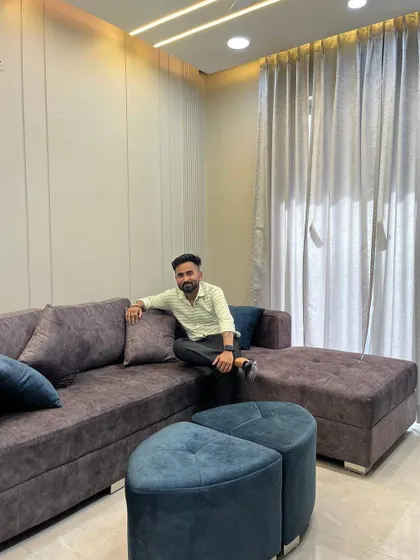 Taking a moment to enjoy the comfortable custom sofa we provided for the Gurgaon project.