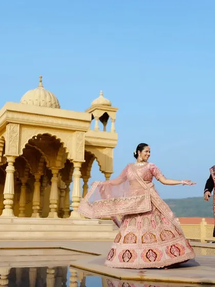 A majestic backdrop for a love story that feels like royalty. I focus on capturing movement and emotion, making you feel like the main characters in your own romantic film. This shot was taken at a stunning architectural location near Pune.