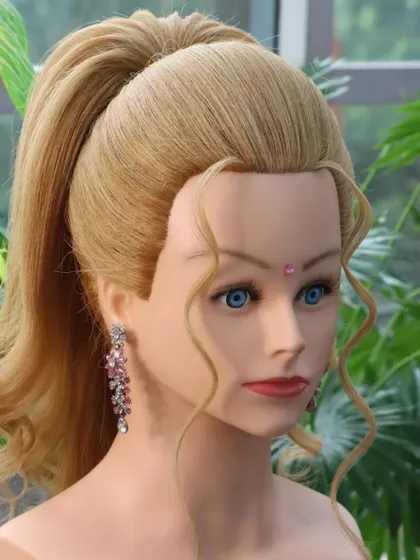 Another angle of the pop-out unicorn ponytail, showing its clean lines and voluminous feel. A great style for a chic and fashionable look.