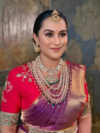 A classic portrait pose, exuding confidence and timeless South Indian charm.