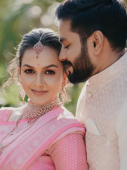 A beautiful close-up portrait of Omkar and Rhutuja. The bride's confident look at the camera combined with the groom's gentle affection creates a stunning image.