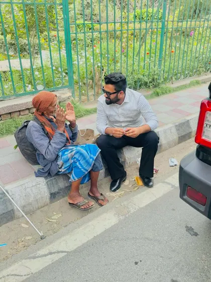 A moment of connection on a Delhi sidewalk. I believe true wealth lies not in riches, but in understanding the lives of the people, the very individuals we aim to serve.