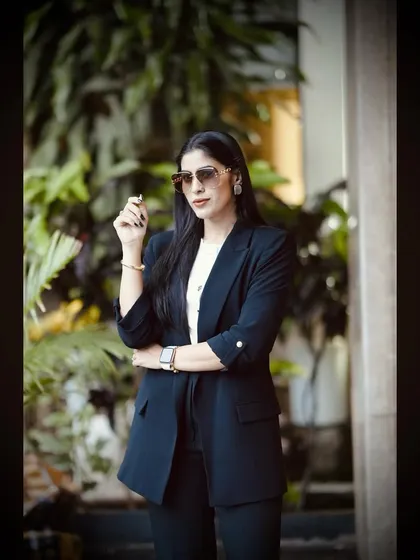 This close-up captures a look of determination and vision. It's the look of a woman who is in control of her destiny.