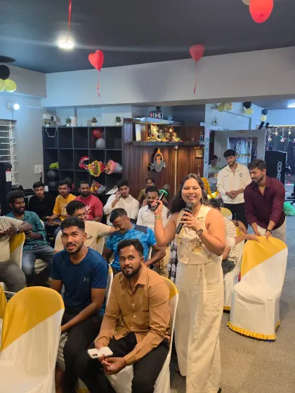 Interacting with the audience at the Core Fitness Gym anniversary. I make sure to move around and engage directly with the crowd, making everyone feel part of the celebration.