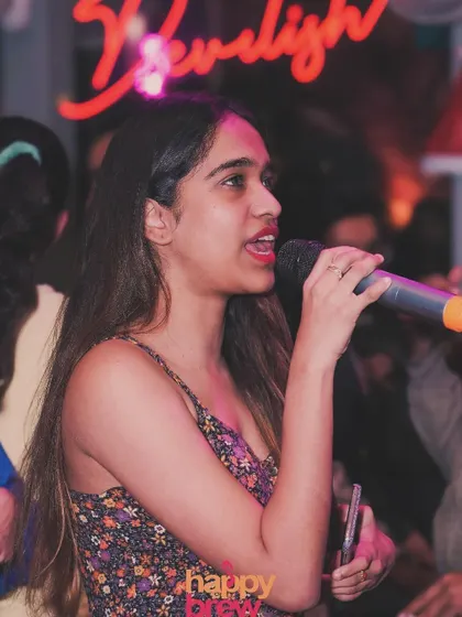 The focus and emotion of a true performer. Every singer gets their moment to shine.