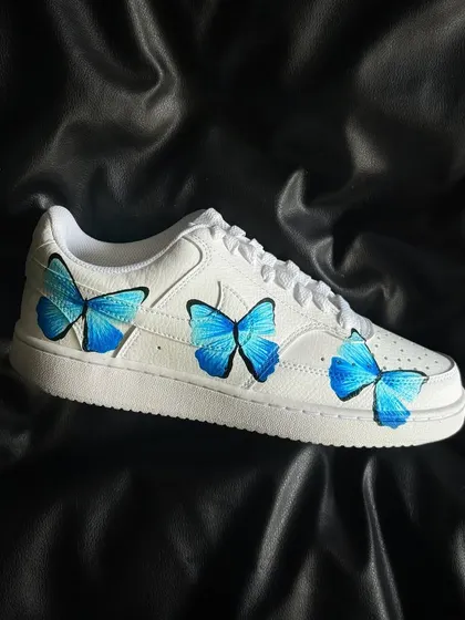 A side profile of the butterfly custom sneaker.