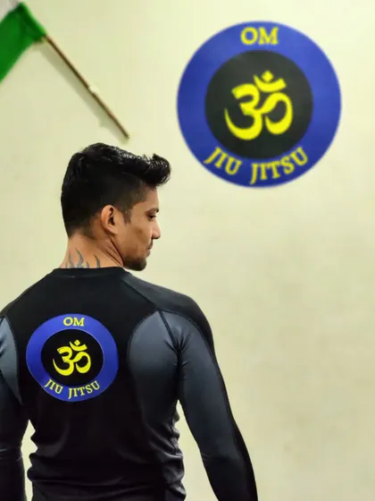 The back of our new rashguard, featuring the Om Jiu-Jitsu logo. This represents our team and our shared commitment to martial arts.