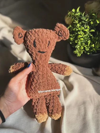 Another look at our crochet version of Mr. Bean's Teddy. Its simple, charming design makes it a timeless gift for both children and adults who grew up watching the iconic show.