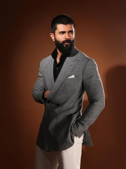 Another angle of Vijay Deverakonda's custom look, highlighting the jacket's perfect fit and how it pairs with simple black trousers for a balanced, powerful statement.