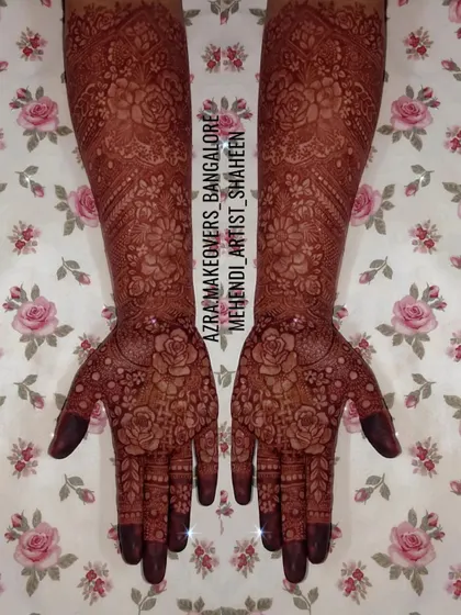 A stunning example of a full-coverage design with a deep red stain, created using the negative space technique.