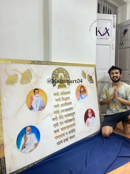 Here I am with the large Navkar Mantra frame, just after finishing it. It's always a proud moment to see a large-scale, custom piece come to life.