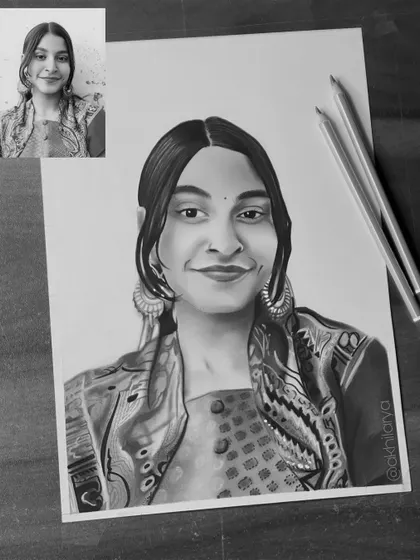 An A4 graphite sketch that captures a natural, smiling expression. The details in her patterned top and large earrings add a lot of character to the portrait.