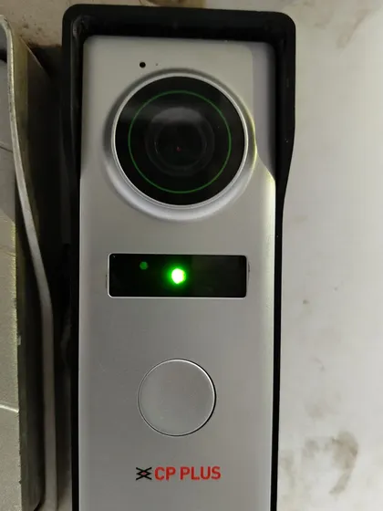 Here is the outdoor camera unit we install at your entrance. It has a high-quality 1.2 MP camera and powerful night vision, so you get a clear picture day or night. This is a genuine CP Plus video door phone camera, built to last.