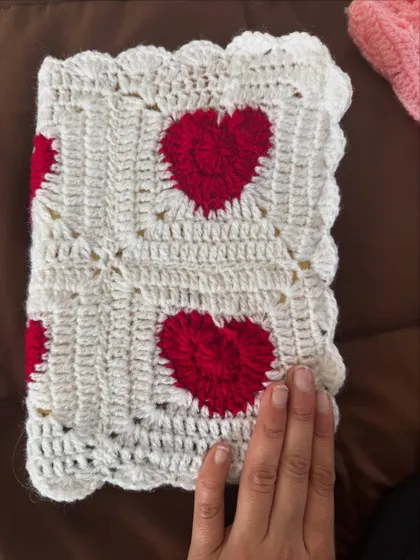 Our popular heart design, now on a book cover. This white cover with red hearts is a classic.