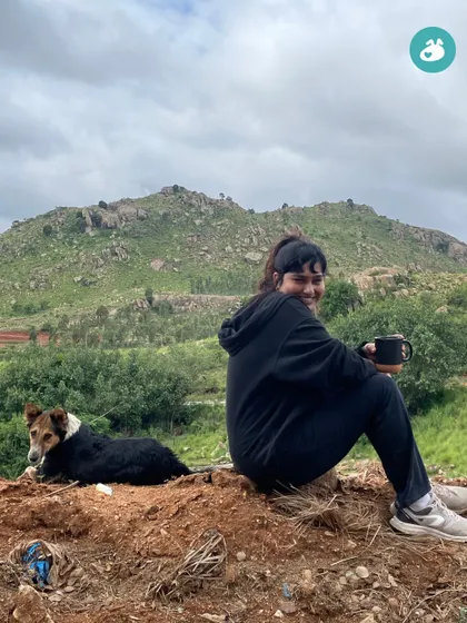 Taking a moment to relax with a cup of chai and a happy dog. These quiet moments of connection are just as important as the hike itself.