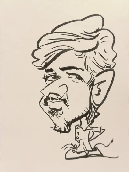 A simple yet expressive black and white portrait. This style is very effective for capturing a person's character in just a few minutes at a live event.