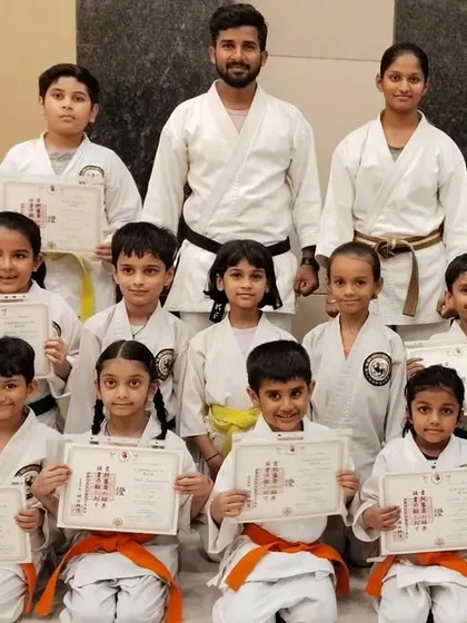 The smiles of achievement are the greatest reward. I am incredibly proud to stand with this group of dedicated young students after their successful belt grading, each holding an internationally recognized certificate of their progress.