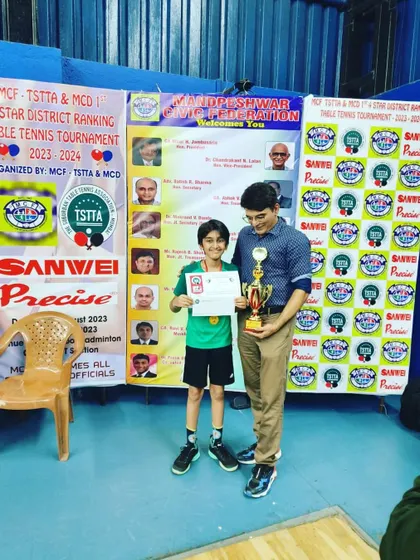Action shots and podium finishes from the 4-star district tournament, highlighting the skills of Aayan, Aakarshan, Daksh, and Bhoomi.
