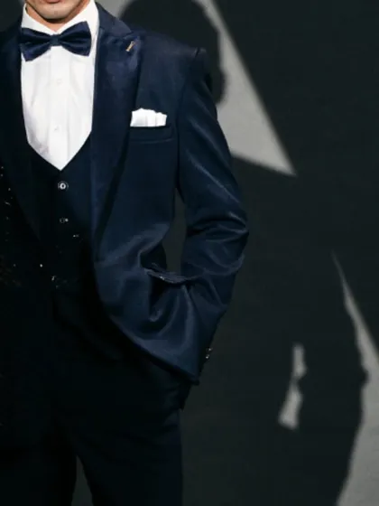 The rich texture of velvet combined with the sparkle of sequins creates a look that is both luxurious and contemporary.